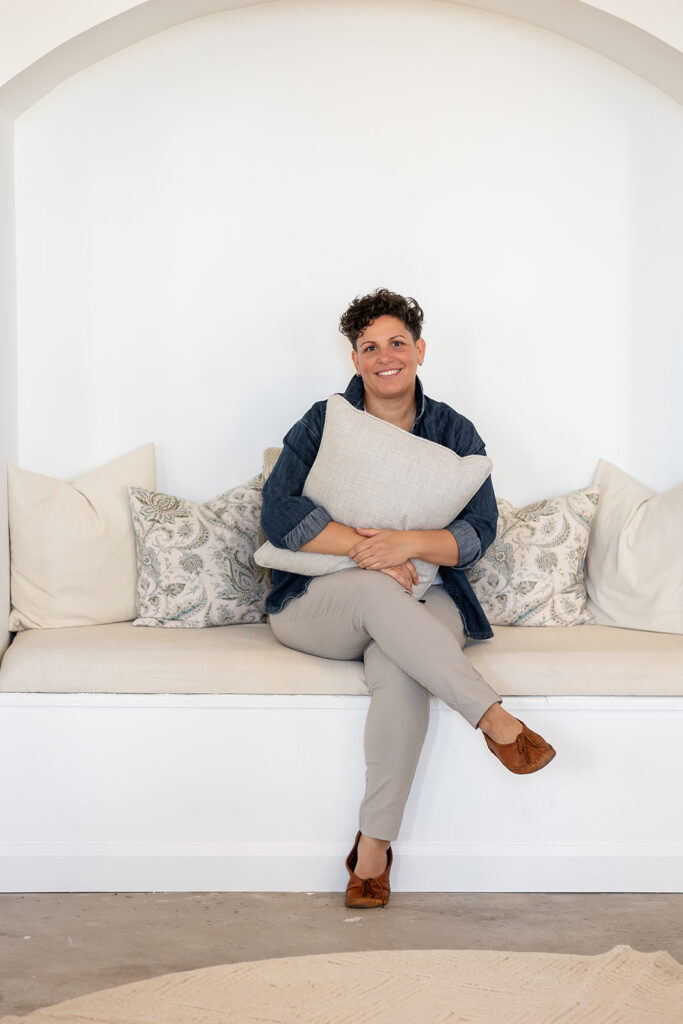 Jill of Energetic Wealth posing in Sunroom Studios during her Signature Brand Session with Portraits by Kendra, photographed in the Kitchener-Waterloo area.