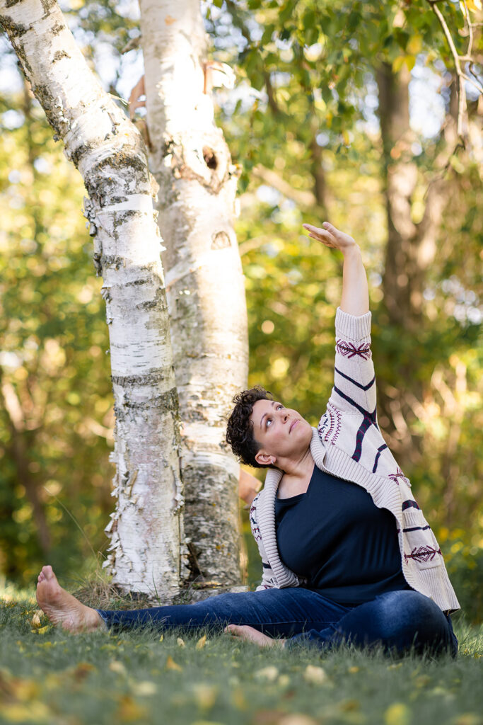 Jill smiling outdoors during her Signature Brand Session with Portraits by Kendra near KW, showcasing her warm and grounded energy.