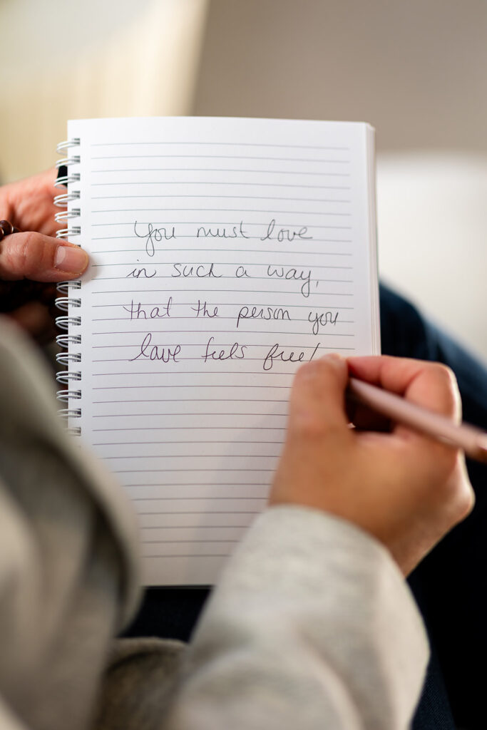 Jill working one-on-one with a client during an Energetic Wealth healing session, photographed by Portraits by Kendra in Kitchener-Waterloo.