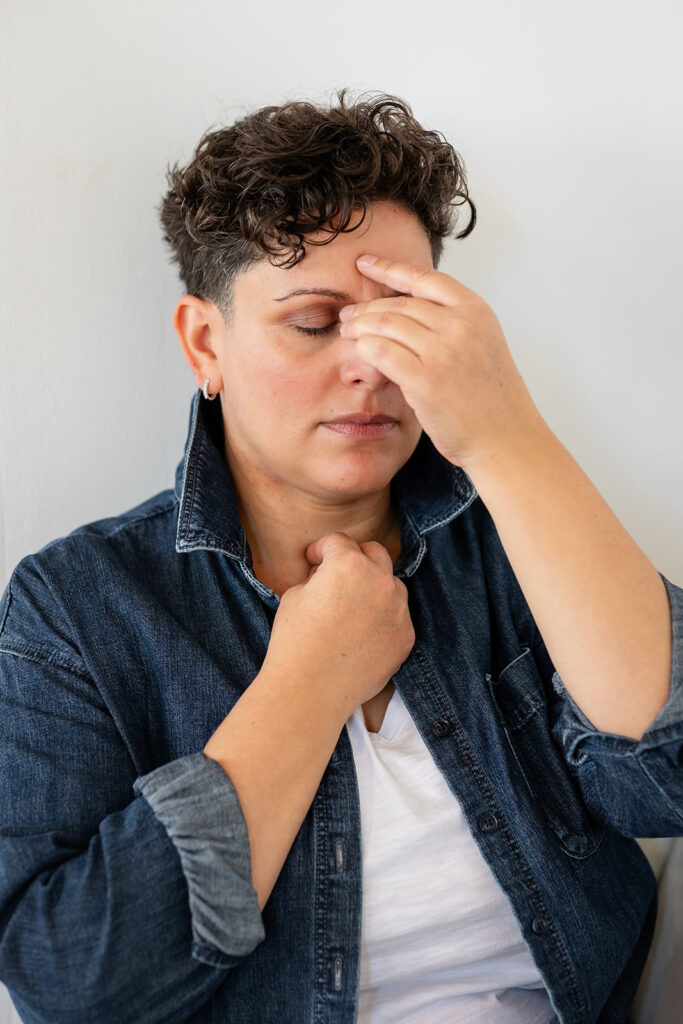 Jill demonstrating EFT tapping, photographed by Portraits by Kendra in Kitchener-Waterloo for Energetic Wealth.