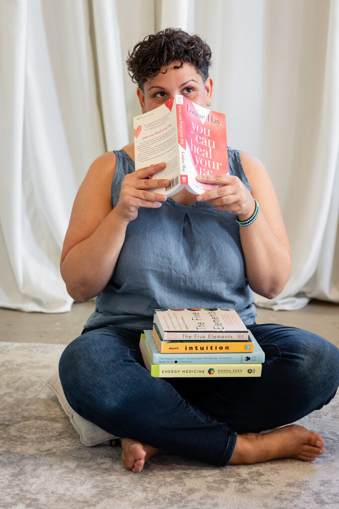 Jill of Energetic Wealth posing in Sunroom Studios during her Signature Brand Session with Portraits by Kendra, photographed in the Kitchener-Waterloo area.