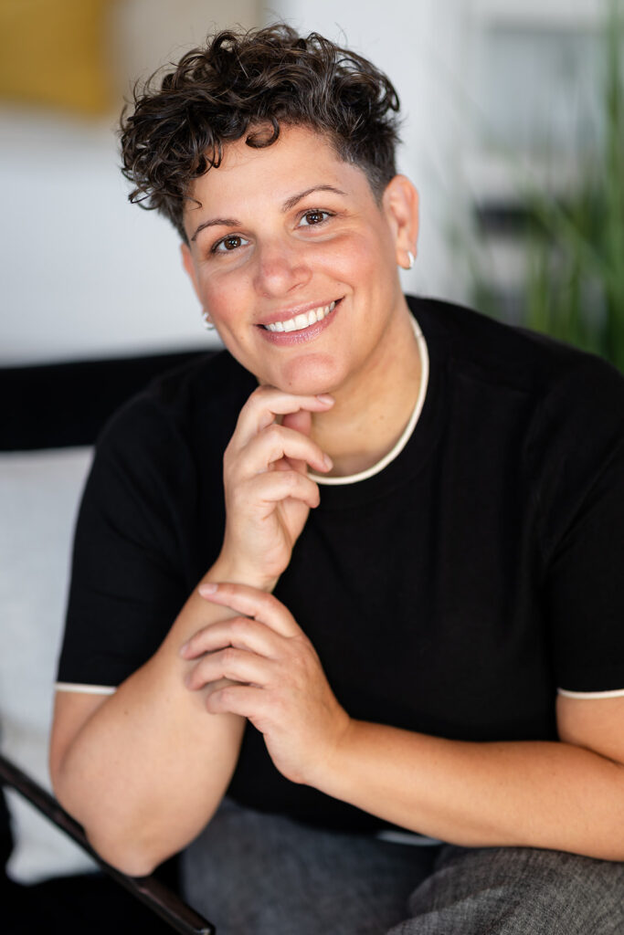 Jill of Energetic Wealth posing in Sunroom Studios during her Signature Brand Session with Portraits by Kendra, photographed in the Kitchener-Waterloo area.