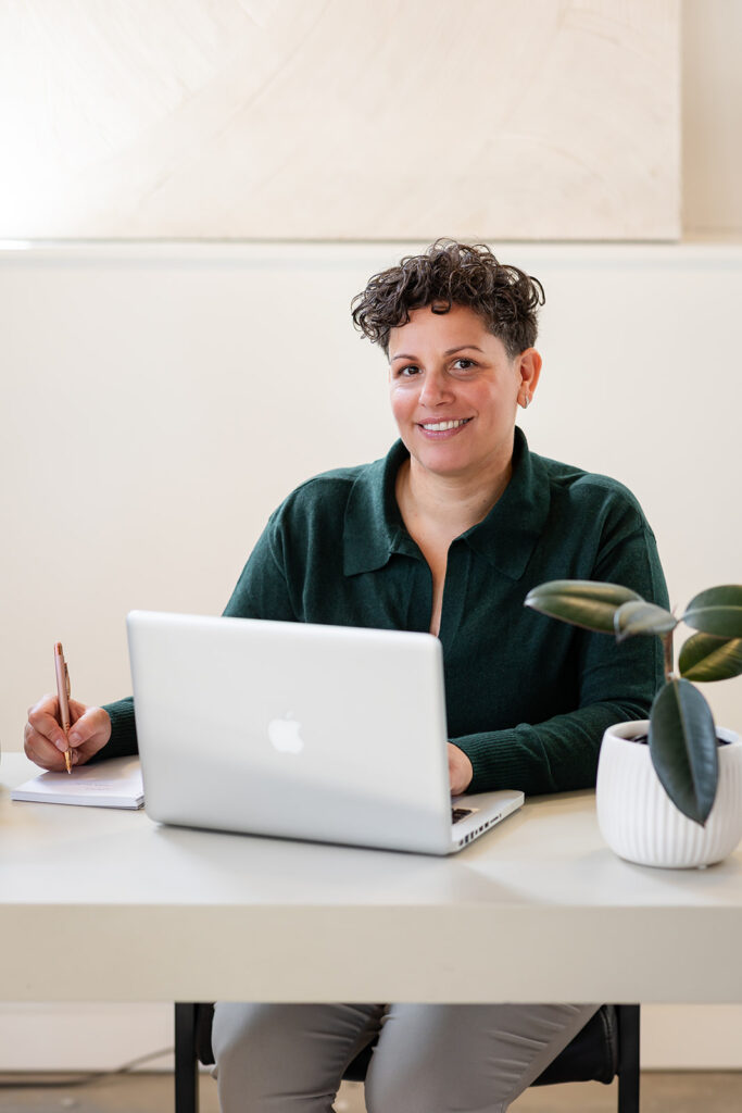 Jill of Energetic Wealth posing in Sunroom Studios during her Signature Brand Session with Portraits by Kendra, photographed in the Kitchener-Waterloo area.
