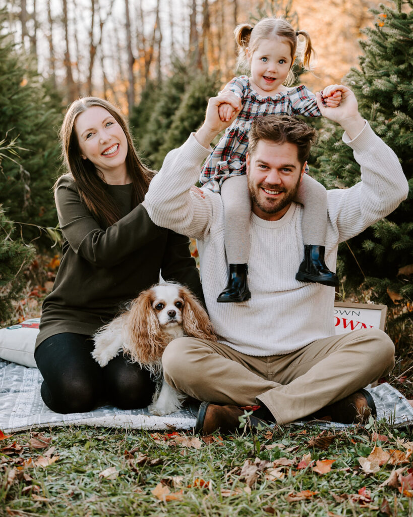 Family with a toddler and their dog enjoying an outdoor photo session with Portraits by Kendra in Kitchener-Waterloo.