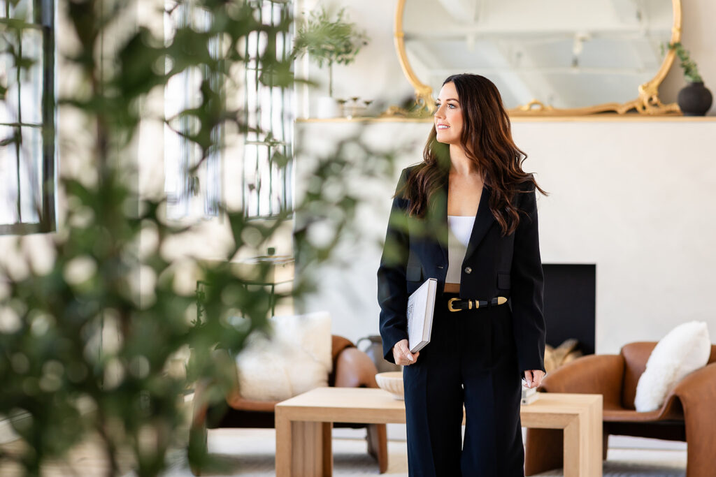 Polished modern branding photo of female entrepreneur taken by Kitchener-Waterloo photographer, Portraits by Kendra.
