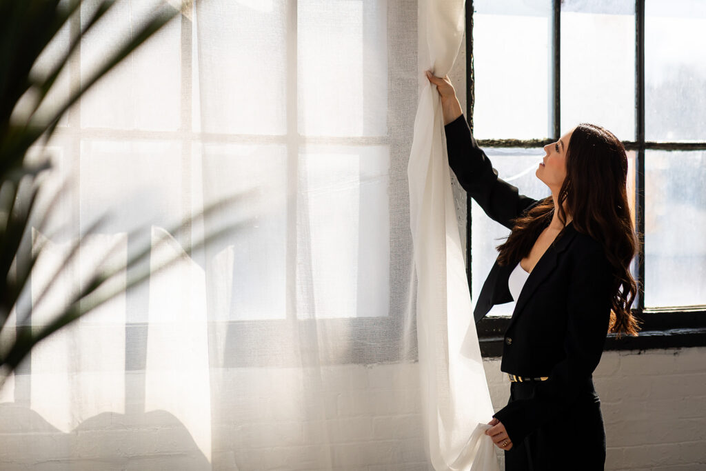 Polished modern branding photo of female entrepreneur taken by Kitchener-Waterloo photographer, Portraits by Kendra.