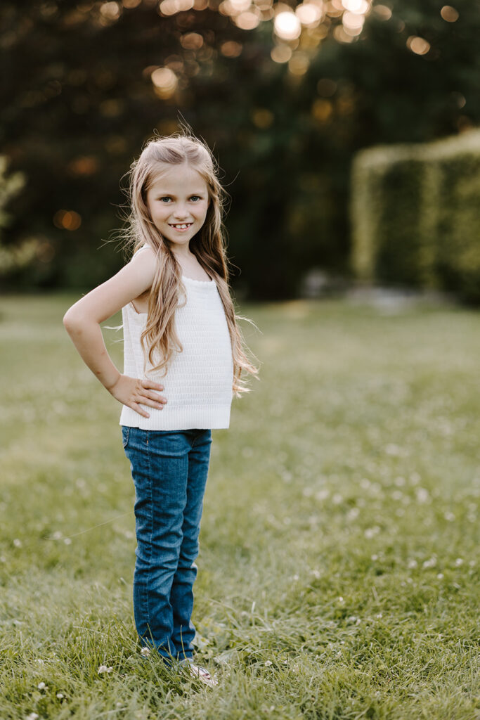 Outdoor photo of young girl taken at the Guelph Arboretum by Kitchener-Waterloo photographer, PortraitsByKendra