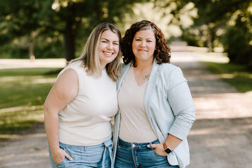 Outdoor photo of couple taken at the Guelph Arboretum by Kitchener-Waterloo photographer, PortraitsByKendra