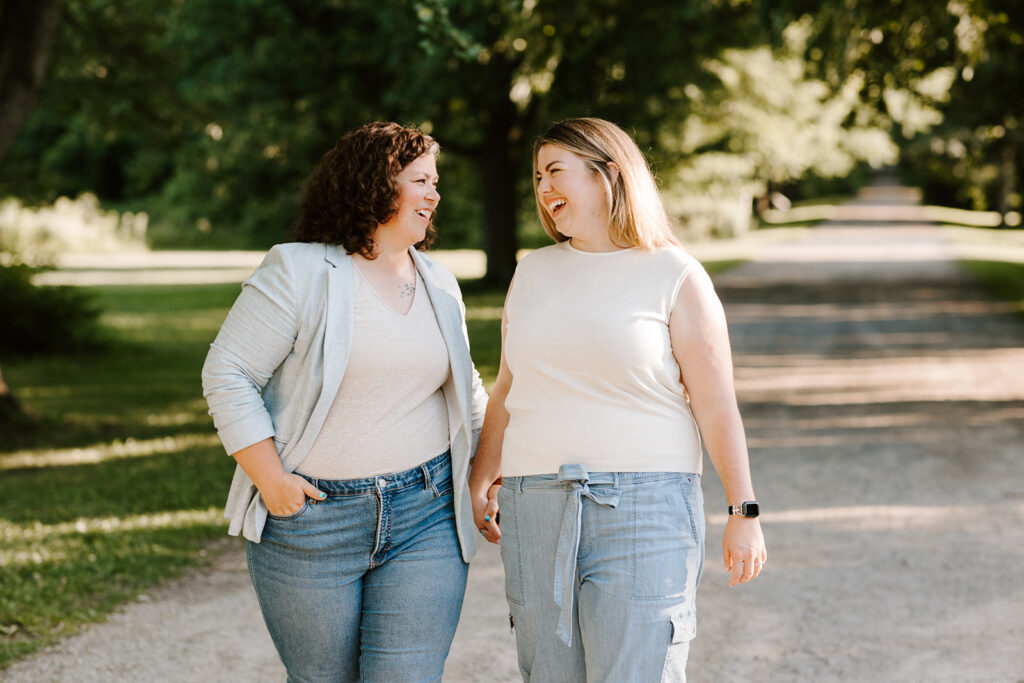 Outdoor photo of couple taken at the Guelph Arboretum by Kitchener-Waterloo photographer, PortraitsByKendra