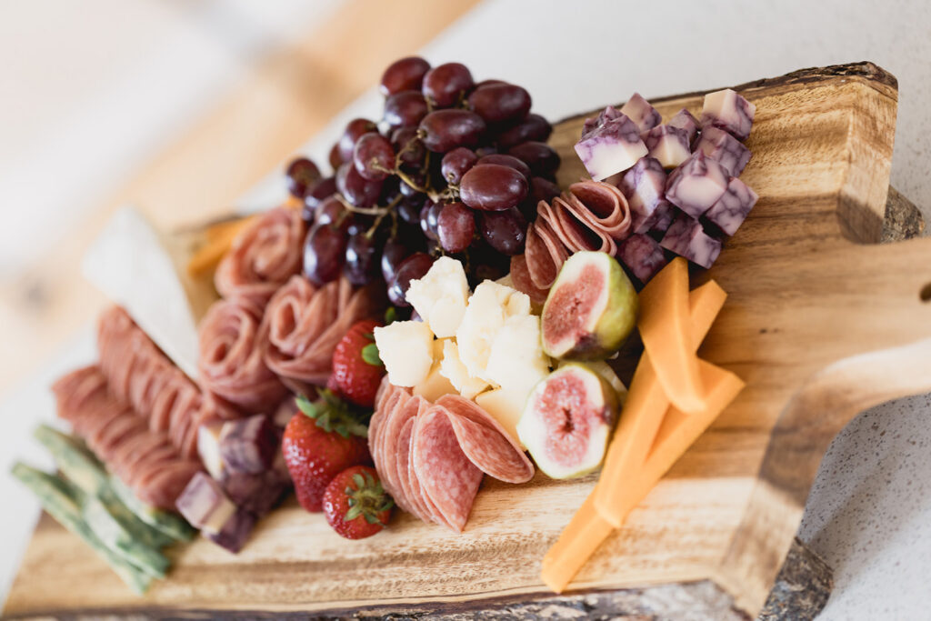 a charcuterie board styled and created by Marycuterie of Waterloo Region and photographed by Portraits by Kendra