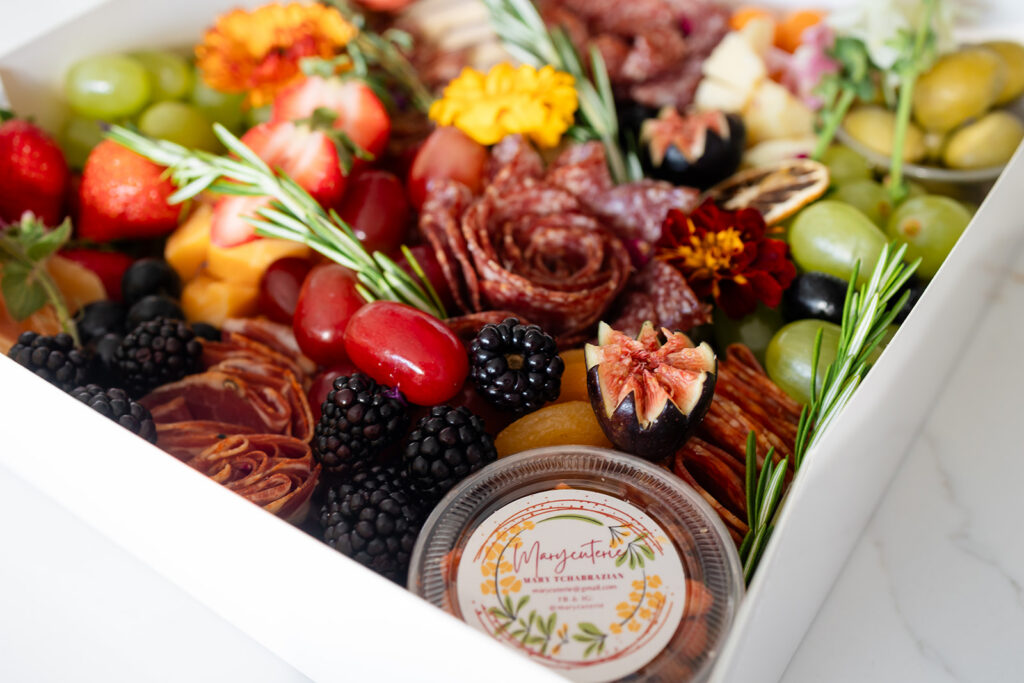 A charcuterie grazing box created by Marycuterie and photographed by Portraits by Kendra during a branding photoshoot in Kitchener-Waterloo