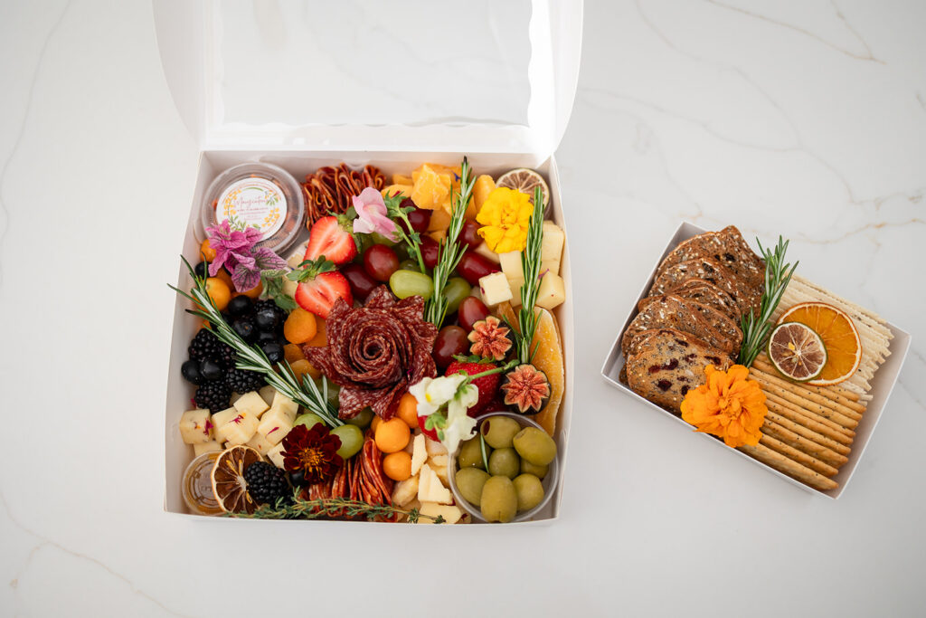 A charcuterie grazing box created by Marycuterie and photographed by Portraits by Kendra during a branding photoshoot in Kitchener-Waterloo