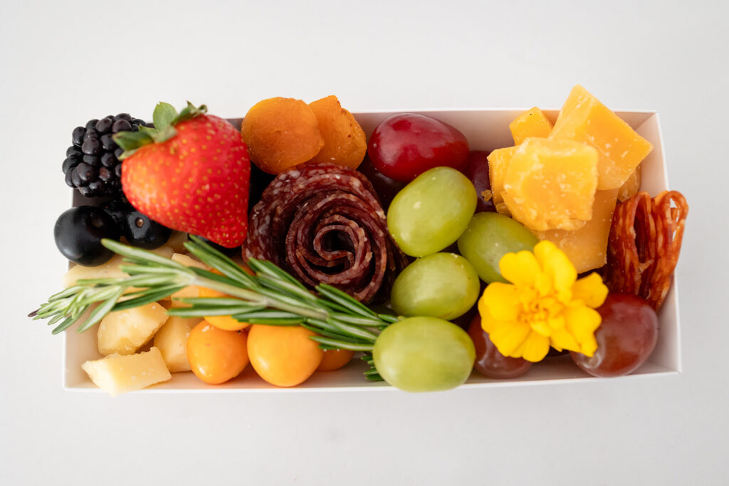 An individual charcuterie grazing box created by Marycuterie and photographed by Portraits by Kendra during a branding photoshoot in Kitchener-Waterloo