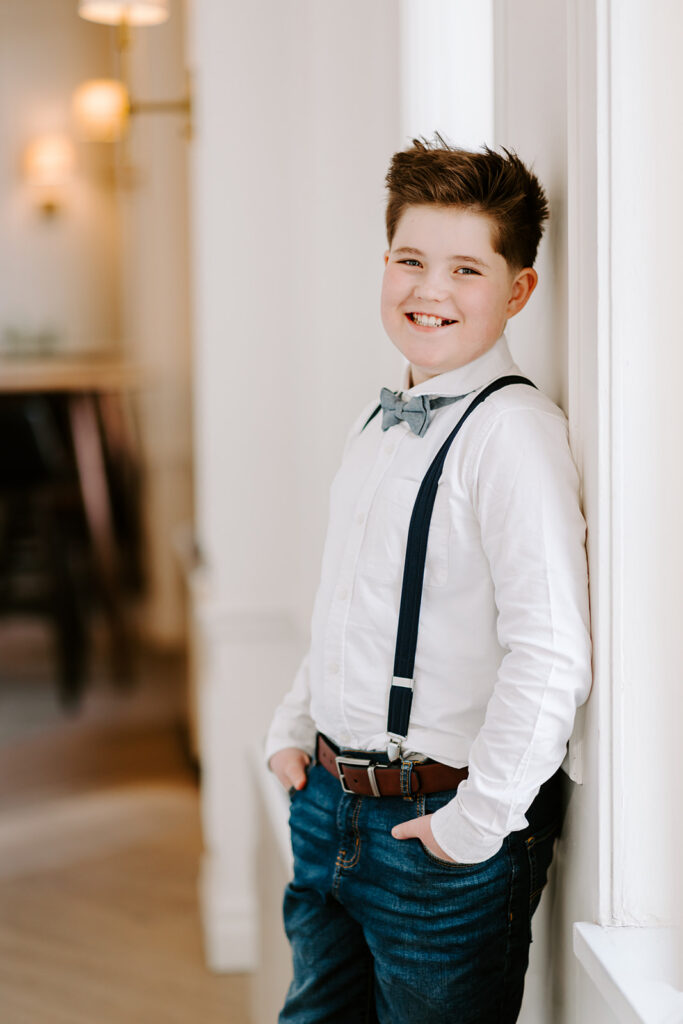 Relaxed teen boy portrait session indoors in Kitchener-Waterloo by Portraits by Kendra