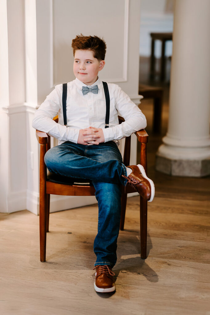 Birthday portrait of a teen boy sitting on a chair—photo taken in Kitchener-Waterloo by Portraits Portrait by Kendra.