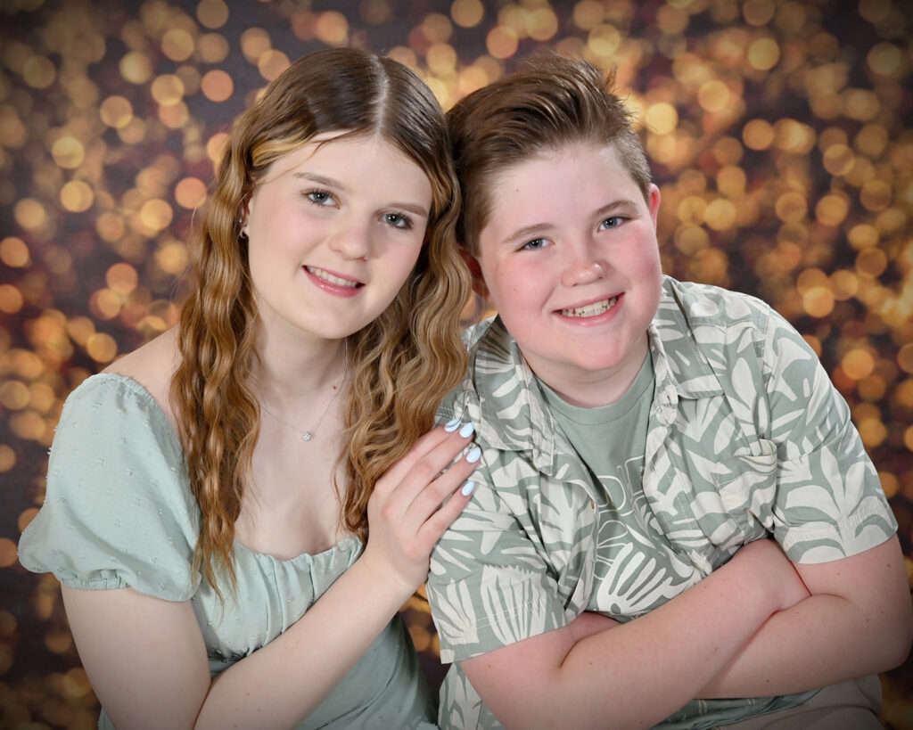 Photo of siblings taken during a Carnival cruise vacation