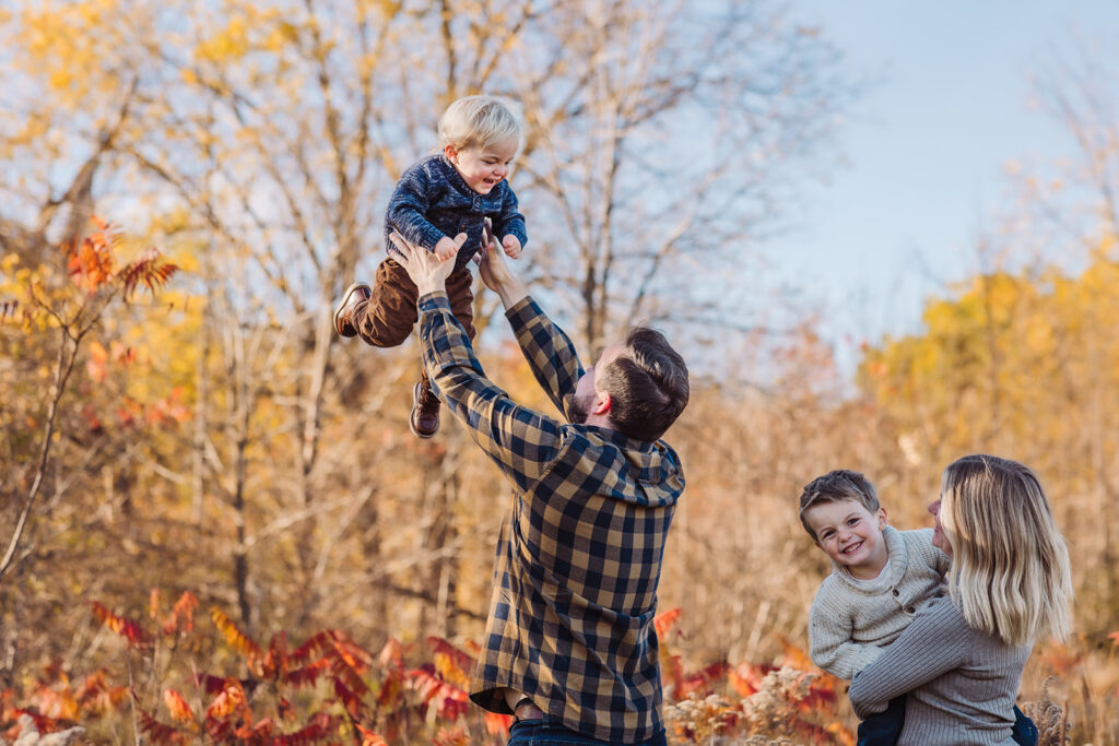 Photo of famiy taken by Portraits by Kendra during a Fall family session in Kitchener-Waterloo
