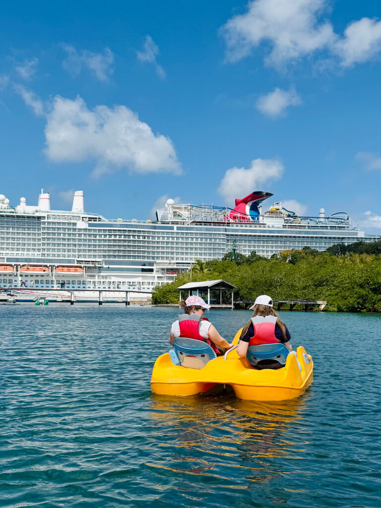 siblings paddleboatng during an excursion with carnival on March Break 