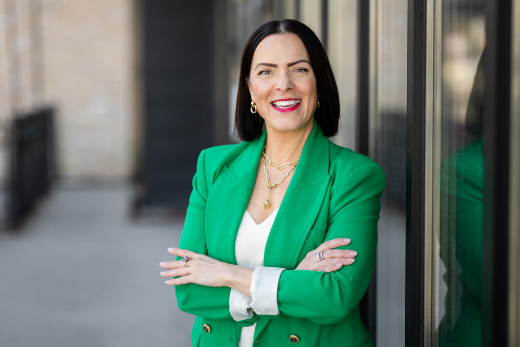 Modern LinkedIn Headshot of woman standing outside photographed in Kitchener-Waterloo  by Portraits by Kendra
