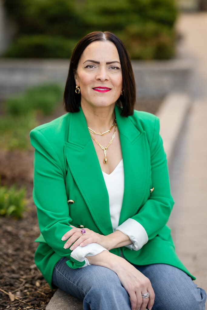 Modern LinkedIn Headshot of a woman sitting outside photographed in Kitchener-Waterloo  by Portraits by Kendra