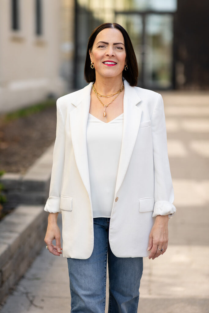Modern LinkedIn Headshot of woman walking outside photographed in Kitchener-Waterloo  by Portraits by Kendra