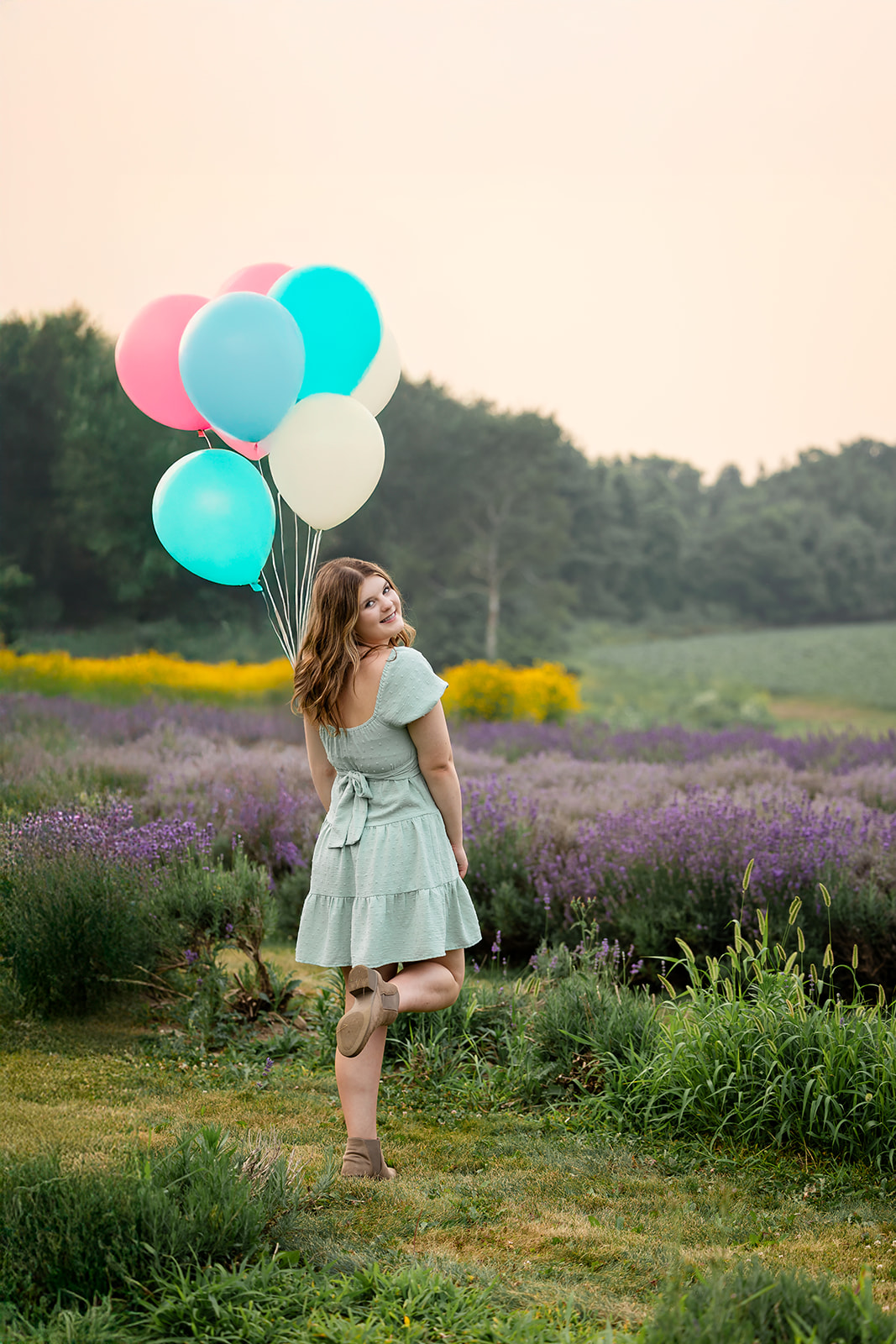 Birthday portrait session at a lavender farm in Ayr, Ontario, golden hour natural light photography.