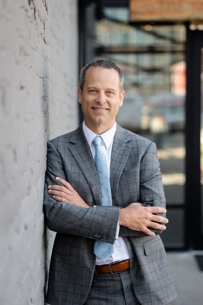 Professional headshot of a man at The Tannery District in Kitchener