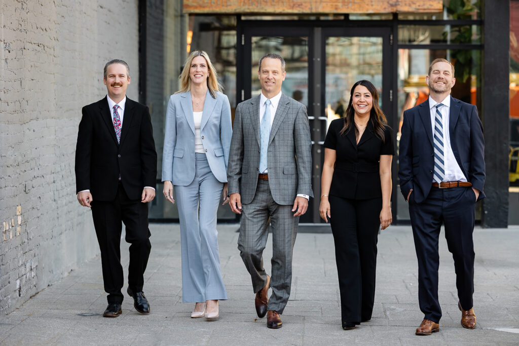 Corporate team walking together at The Tannery District in Kitchener