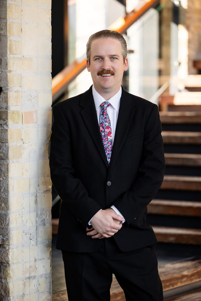 Professional headshot of a man at The Tannery District in Kitchener