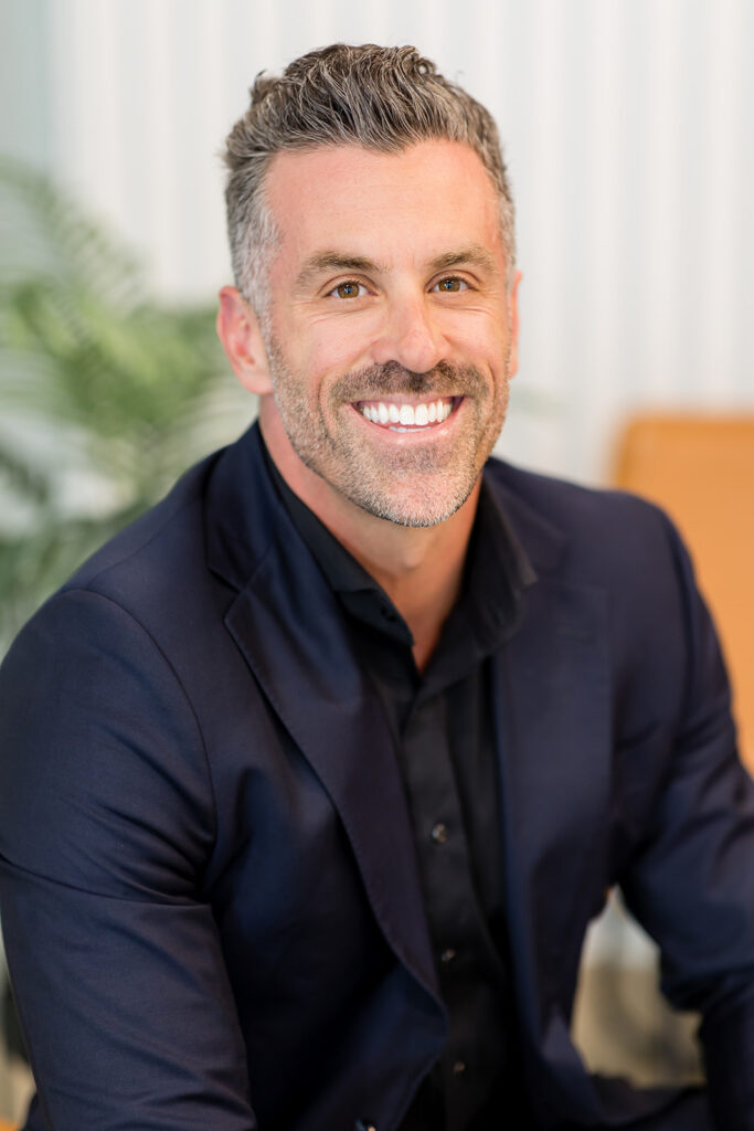 Polished yet natural professional headshot by Kitchener-Waterloo photographer Kendra - modern headshots for real people.